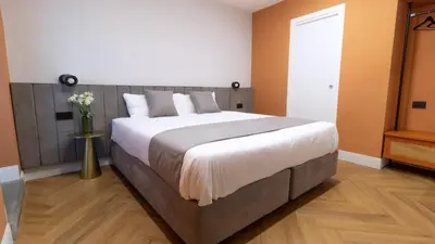 Letto o letti in una camera di Musto Boutique Apartments