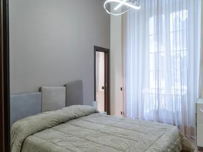 Letto o letti in una camera di Apartment in Palazzo Nana', Piazza Nicola Amore, Napoli - Holidays a Napule