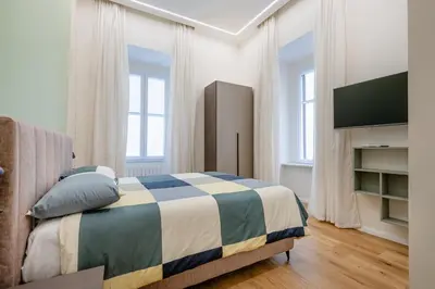 Letto o letti in una camera di Giantri Home Spaccanapoli Metro Duomo centro storico Napoli sotterranea Crist velato Cappella Sansevero a 5 min dal porto