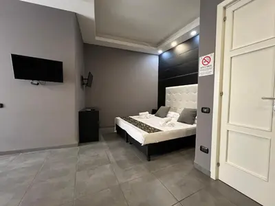 TV o dispositivi per l'intrattenimento presso Nereides Guest House