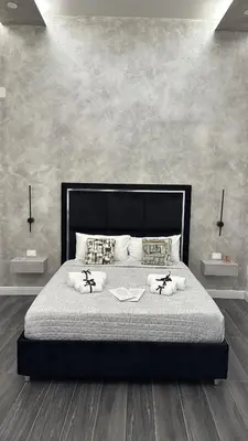 Letto o letti in una camera di Kairos Relais