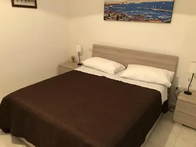 Letto o letti in una camera di Simo Home