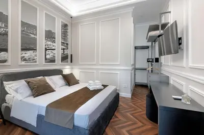 Letto o letti in una camera di Naples Plaza Duomo