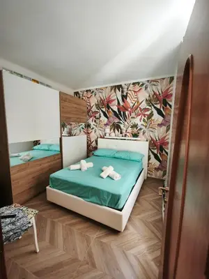 Letto o letti in una camera di ILVAFARo