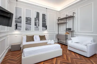 Letto o letti in una camera di Naples Plaza Duomo Apartment