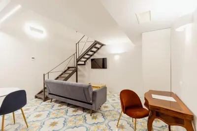 Area soggiorno di Atri Rooms Centro Storico Napoli