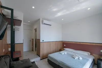 Letto o letti in una camera di Mia Suites Angioino