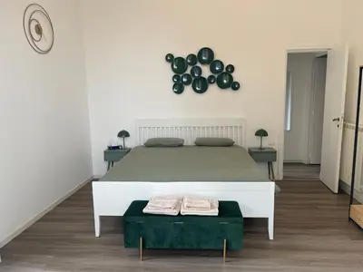 Letto o letti in una camera di Live Napoli! Top Central Spacious Apartment La Casa Di Marina