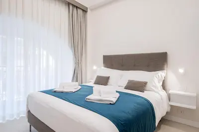Letto o letti in una camera di Na'more Partenope Apartment