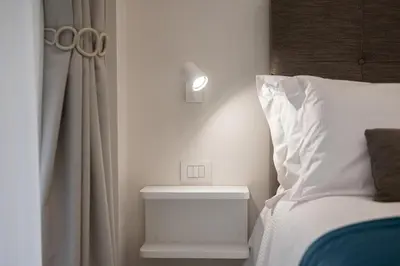 Letto o letti in una camera di Na'more Partenope Apartment