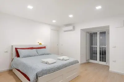Letto o letti in una camera di Casa Candido - Urban Experience