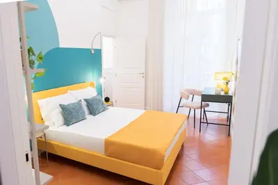 Letto o letti in una camera di Palazzo Castriota Scanderbeg Apartment - City Center Apartment