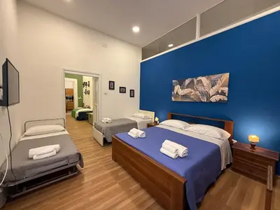 Letto o letti in una camera di Casa Donna Caterina