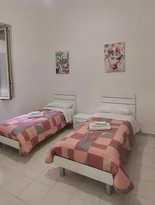 Letto o letti in una camera di Annunziata House
