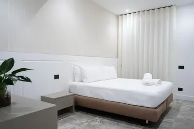Letto o letti in una camera di Rumi Luxury Rooms