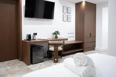 Letto o letti in una camera di Rumi Luxury Rooms