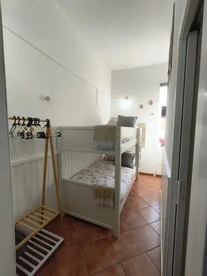 Letto o letti in una camera di Regina Partenope Home
