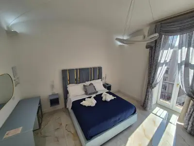 Letto o letti in una camera di Arco Boutique Rooms