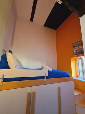 Letto o letti in una camera di Boutique Apartment Spaccanapoli