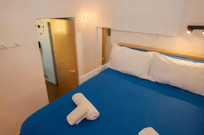 Letto o letti in una camera di Boutique Apartment Spaccanapoli