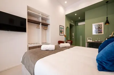 Letto o letti in una camera di Vomerè