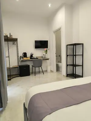 TV o dispositivi per l'intrattenimento presso Le Coccinelle - B&B Napoli
