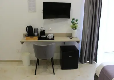 TV o dispositivi per l'intrattenimento presso Le Coccinelle - B&B Napoli