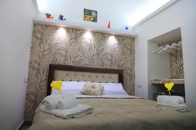 Letto o letti in una camera di Sweet home Serena