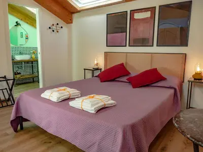 Letto o letti in una camera di Wind Rose - Ventaglieri Terrace