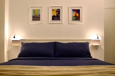 Letto o letti in una camera di Guest House dei Poeti