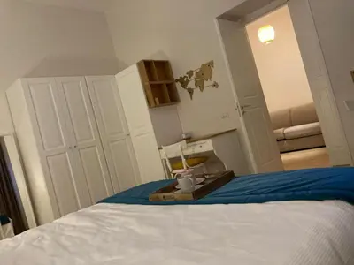 Letto o letti in una camera di L'Arco dell'Anticaglia