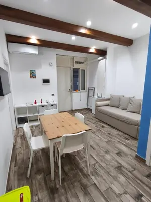 Area soggiorno di The House SAN GENNARO