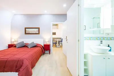 Letto o letti in una camera di O Panaro Lucky Flat by NapoliApartments