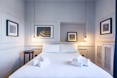 Letto o letti in una camera di Elite Art Palace by Napoliapartments