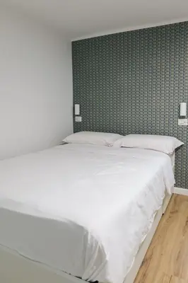 Letto o letti in una camera di Ludo&Bea Apartment