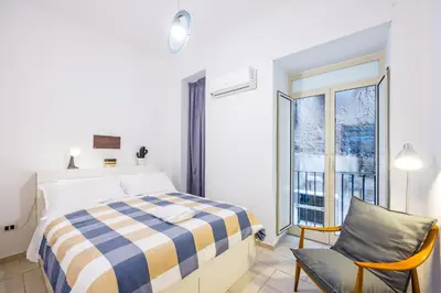 Letto o letti in una camera di Loft Borgo Orefici