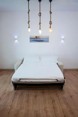 Letto o letti in una camera di San Gennà Urban Suite Napoli