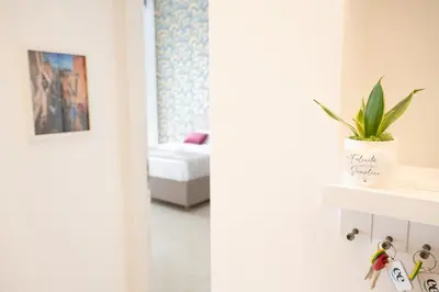 Letto o letti in una camera di Feel Napoli nuovo, comodo, centrale e a 2 min dalla Metro!