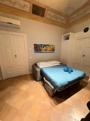 Letto o letti in una camera di Donna Sofi Naples
