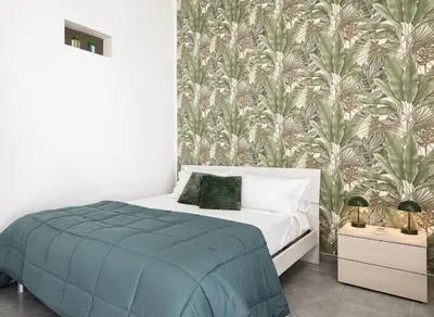 Letto o letti in una camera di Green House Center