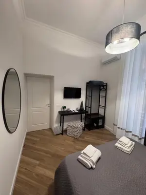 Letto o letti in una camera di La Boutique del Centro