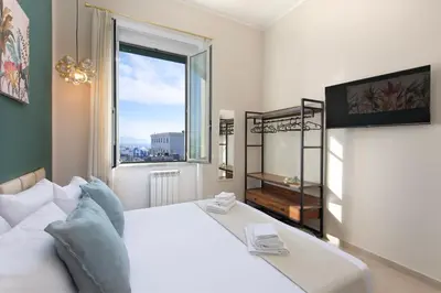 Letto o letti in una camera di Porto Partenope - Exclusive Apartment