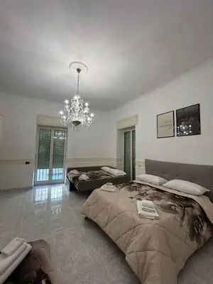 Letto o letti in una camera di Nonna Rosa Home