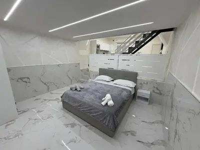 Letto o letti in una camera di Re Ladislao Apartment