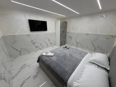 Letto o letti in una camera di Re Ladislao Apartment