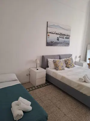 Letto o letti in una camera di Toledo Comfort Apartment in Napoli