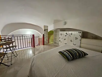 Letto o letti in una camera di Confortable very central loft