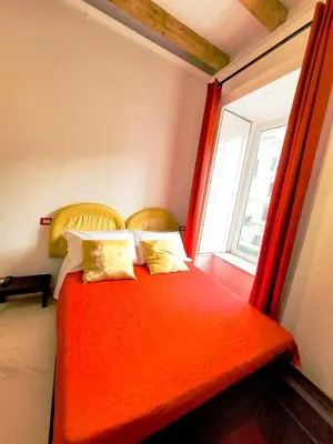 Letto o letti in una camera di I Migliori Artisti New