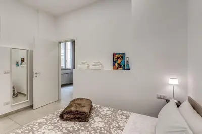 Letto o letti in una camera di Casa Anna