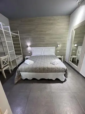 Letto o letti in una camera di Alis Vanvitelli Apartment